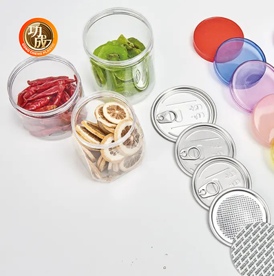 Des pots en plastique PET à bouche large et claire en forme de cylindre pour le chocolat